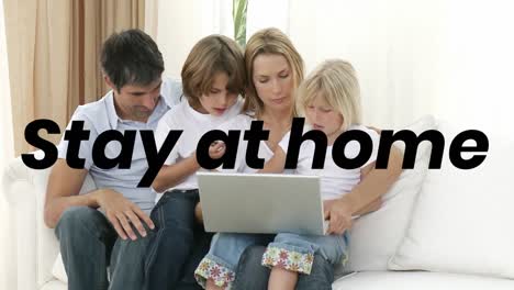 animation of stay at home text over family with two children using laptop