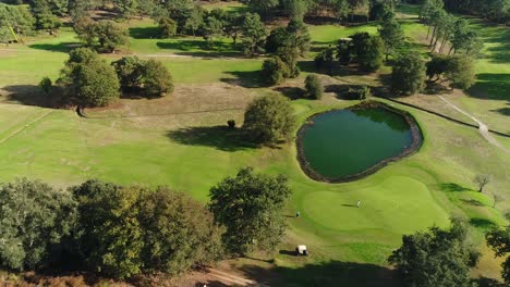 Aerial-View-Luxury-Golf-Course-In-The-Forest-4K