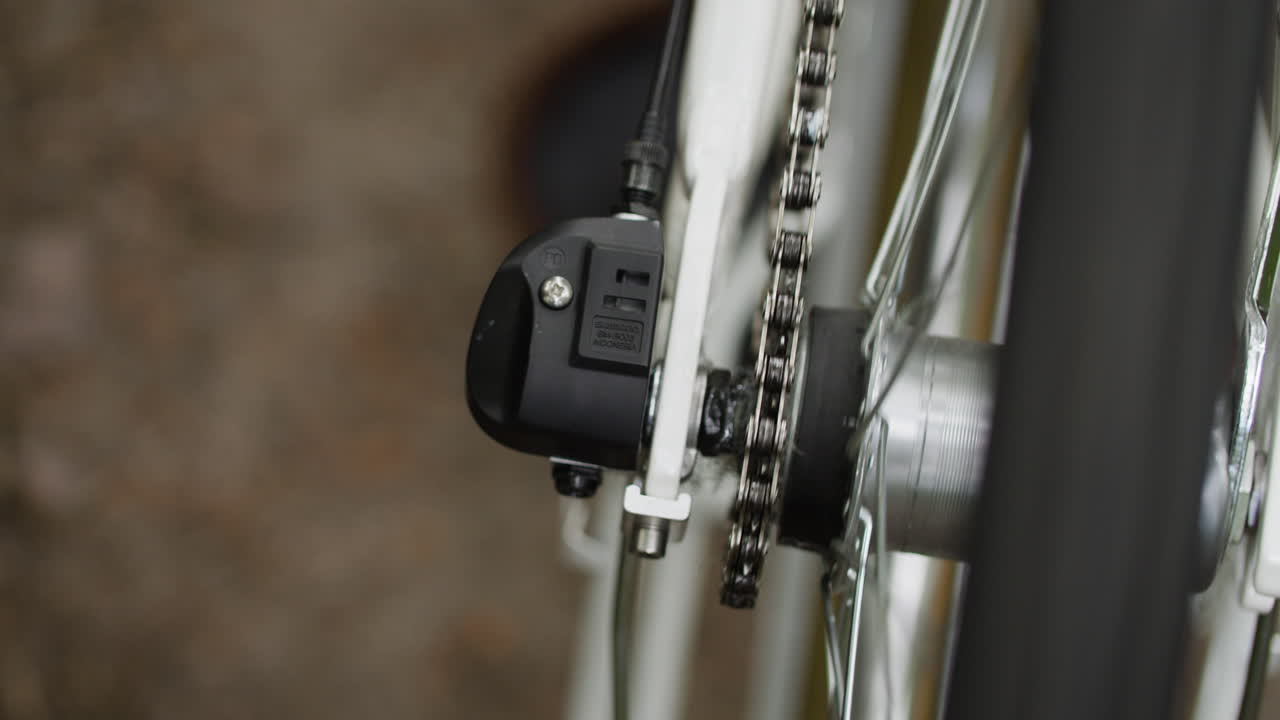 Close-up of bicycle chain and gear hub