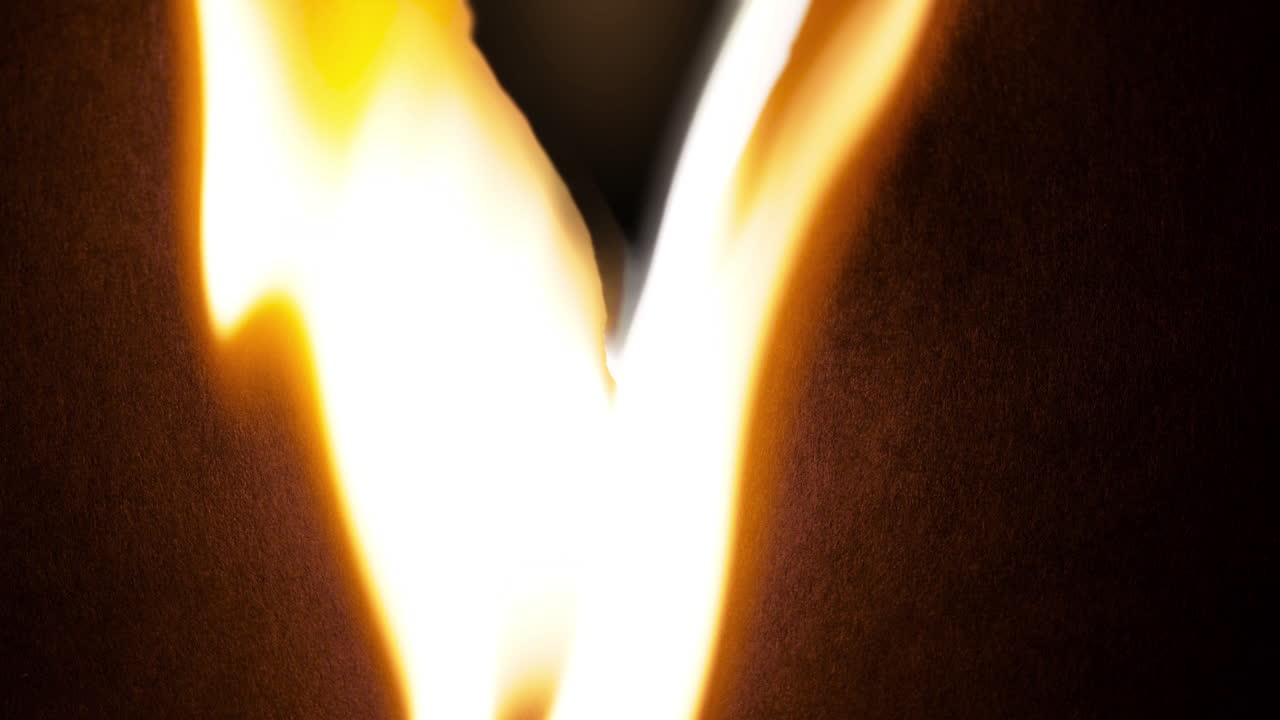 Dynamic Abstract Orange and Yellow Light Flowing on Black