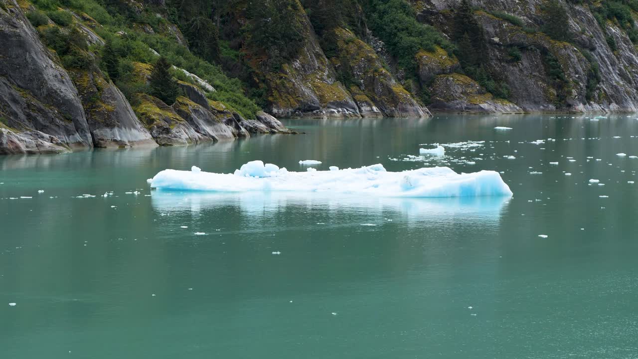 Iceberg in the waters of Endicott Arm fjord. Climate change affecting the glaciers of Alaska.