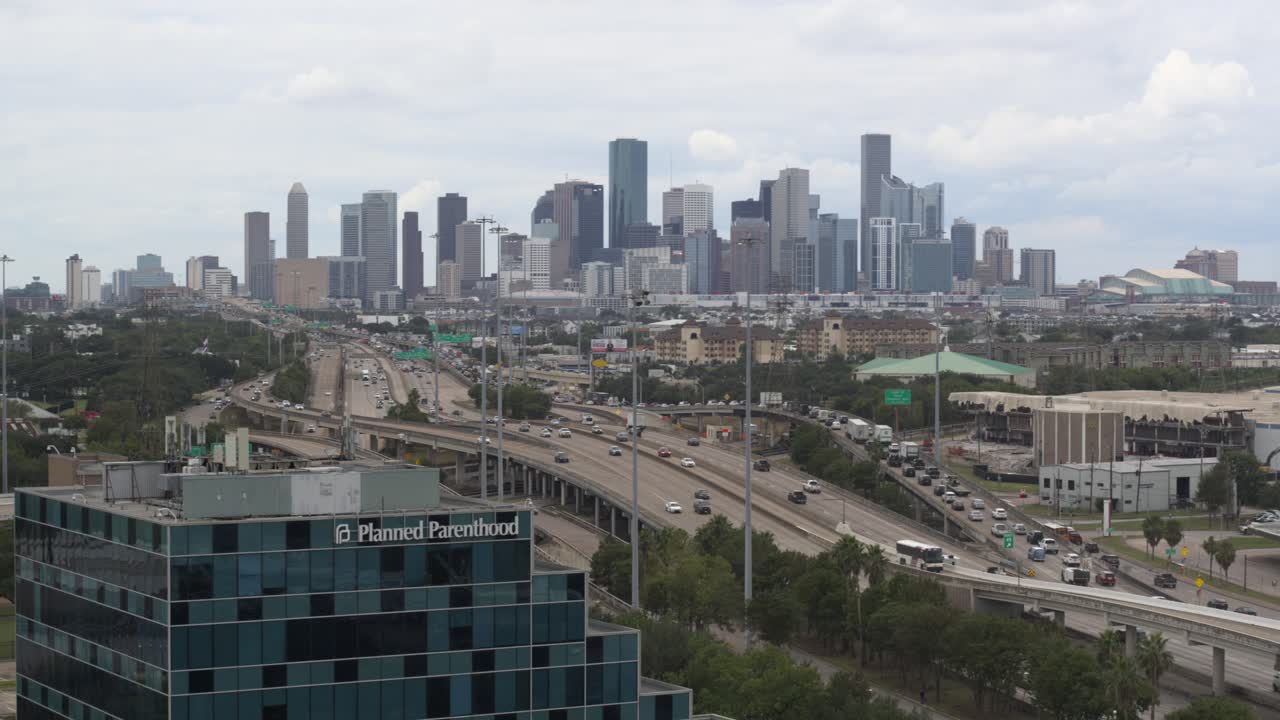 Drone view of Planned Parent Hood building and downtown Houston, Texas