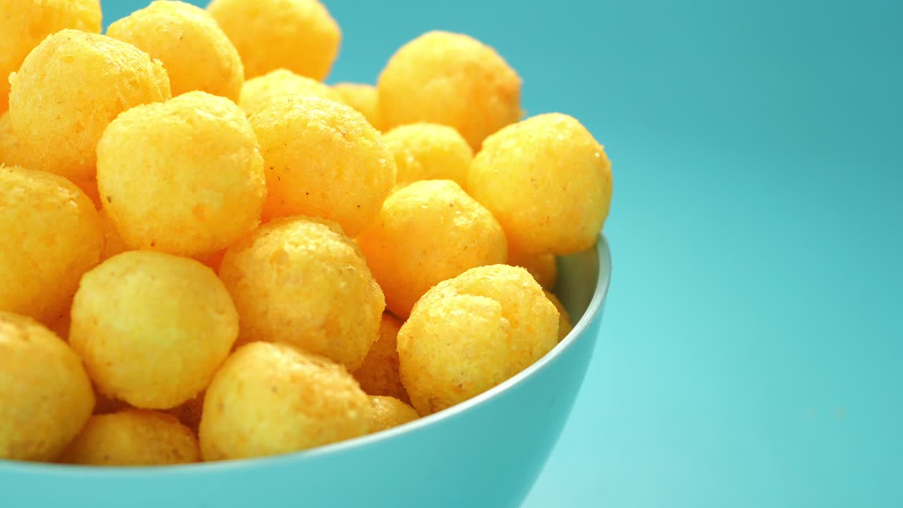 Crispy, Yellow Popcorn Balls in a Bowl