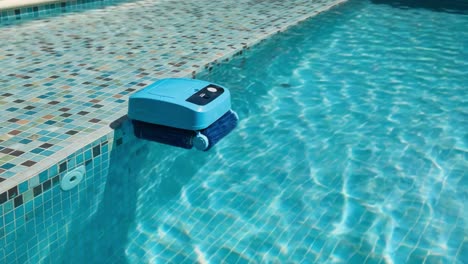 innovative pool cleaner in action: a robotic device perfectly designed for effortless maintenance and crystal-clear water in swimming pools