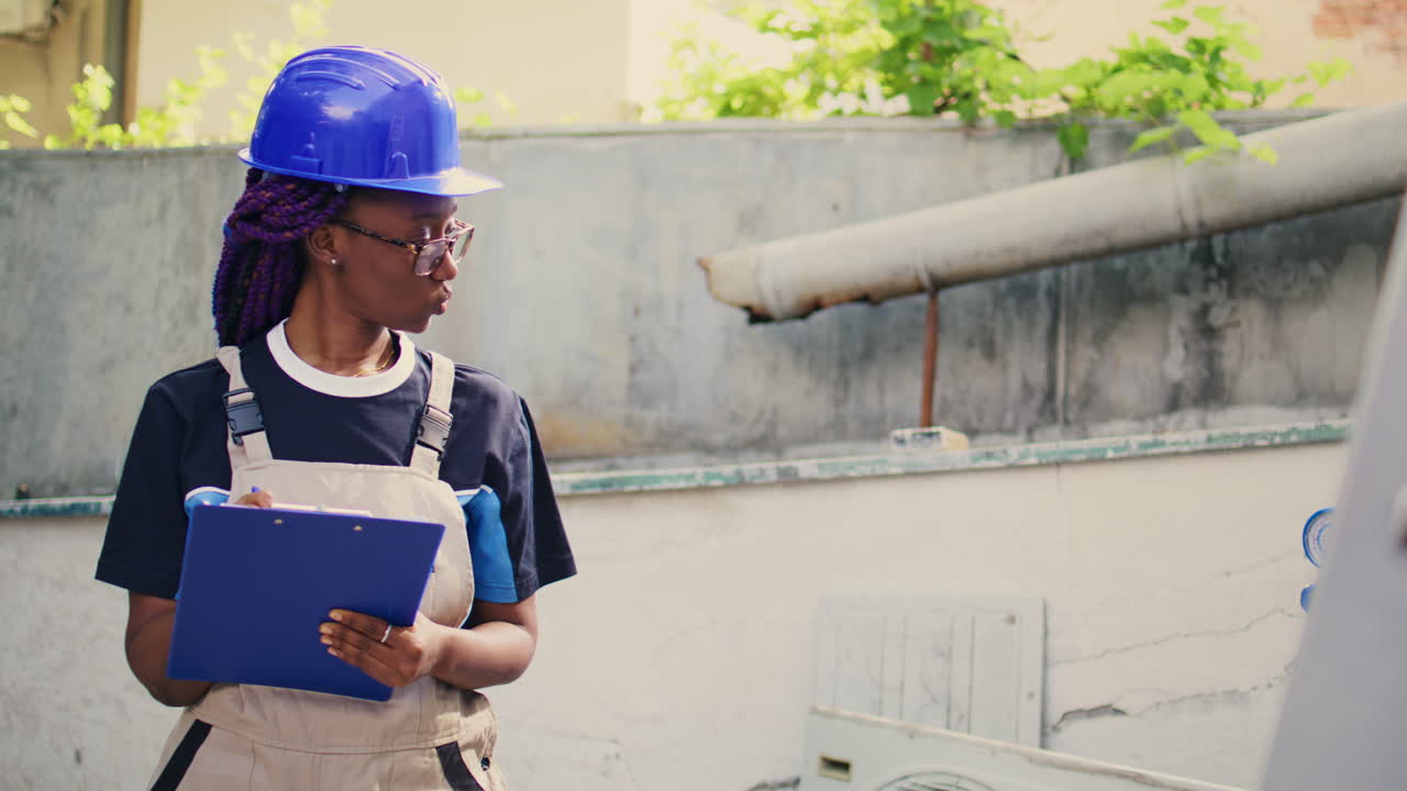 Technician inspecting freon levels
