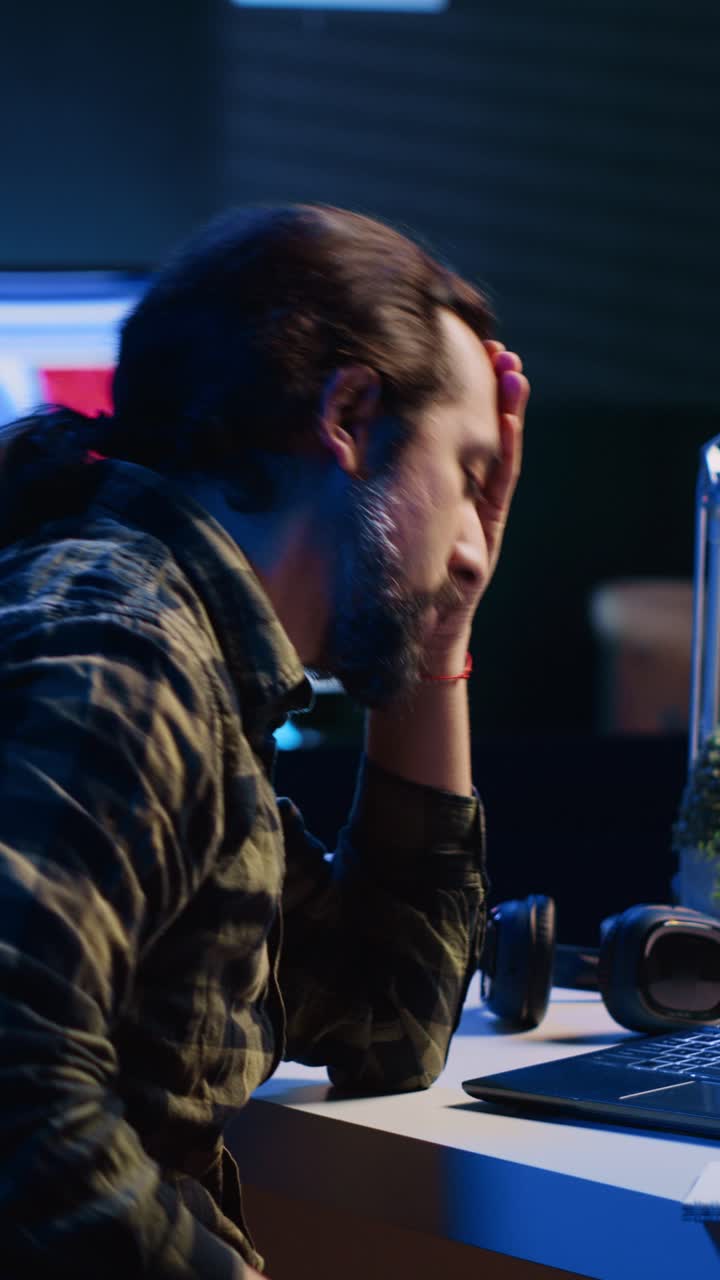 Vertical video Freelancer sighing in frustration after seeing market shares plummeting