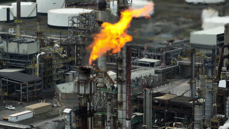 aerial view of oil refinery and exhaust flame