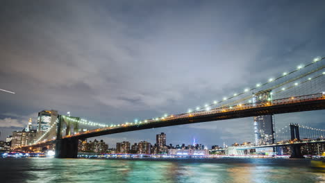 the two most famous bridges in new york are the brooklyn bridge and the manhattan bridge against the