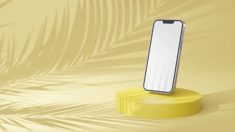 yellow phone mockup with blank screen on podium with palm leaf shadow