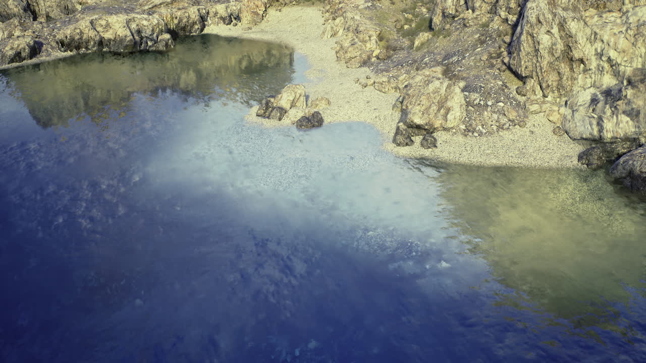 A scenic view of the coast with water and rocks