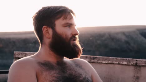 Bearded-man-relaxes-in-the-British-sunshine