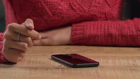 caucasian woman using her phone