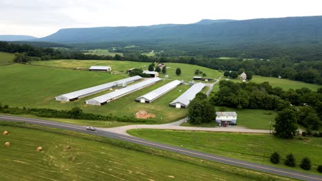 An-aerial-view-of-a-beautiful-playground-and-homes-with-mountain-and-sky-view