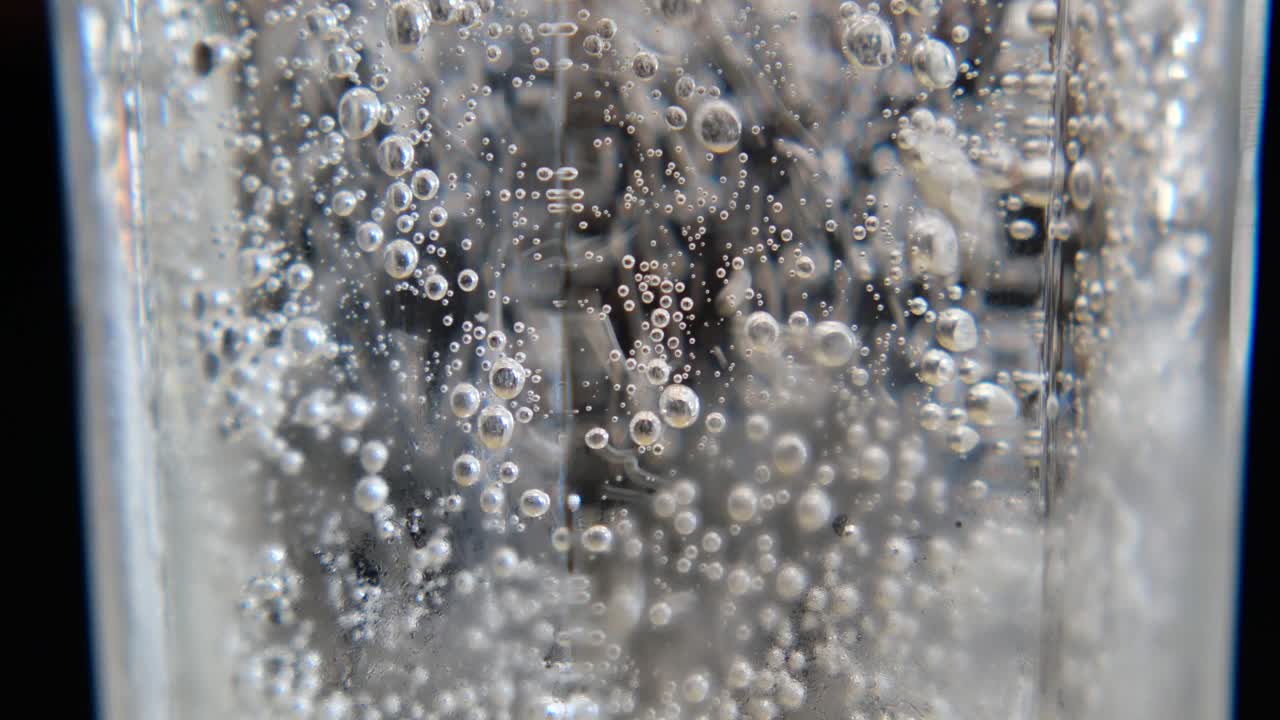Bubbles in a glass of carbonated water
