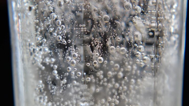 Bubbles in a glass of carbonated water