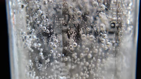 bubbles in a glass of carbonated water