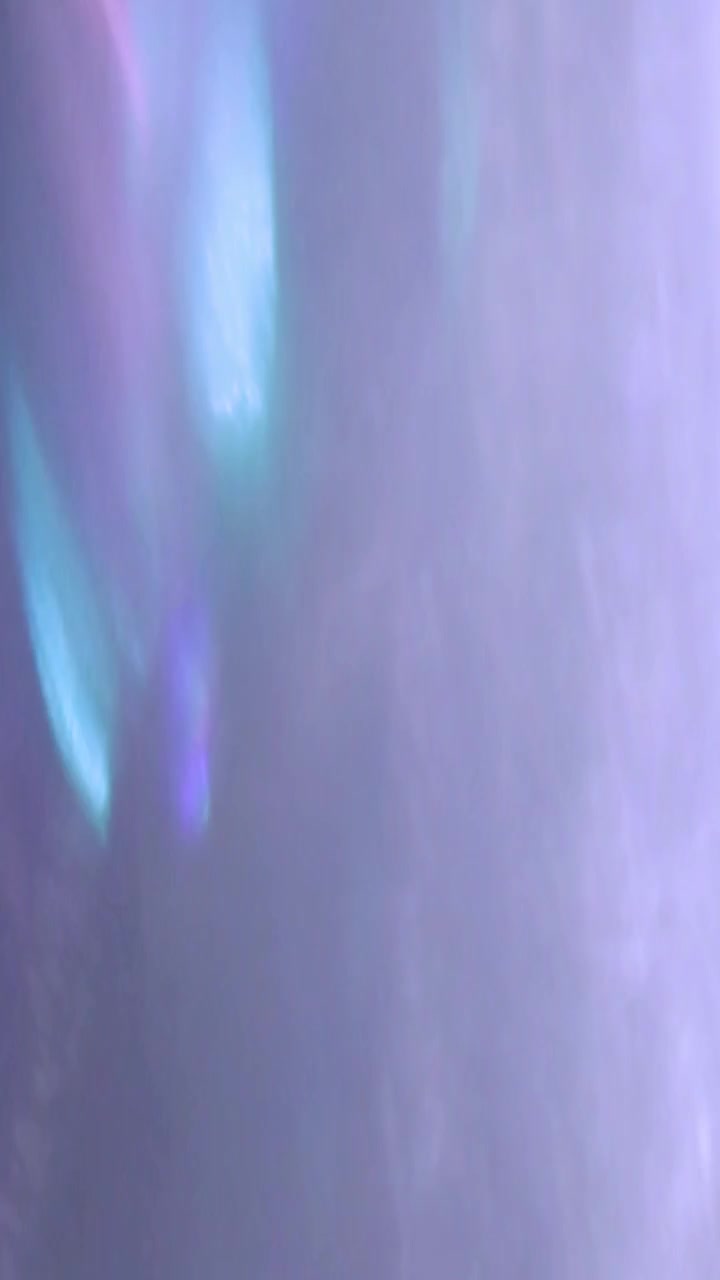 Abstract Light Leaks and Lens Flares in Purple and Green