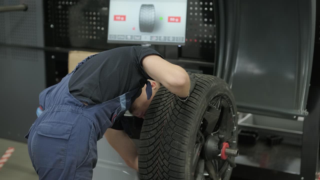 Mechanic working on tire maintenance and repair