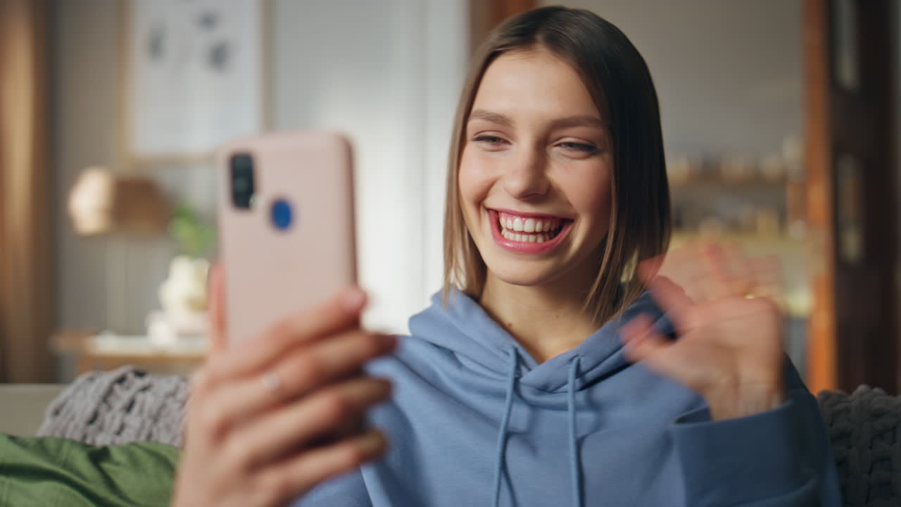 Woman on video call with phone