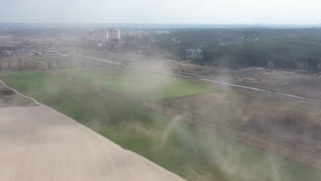 dust storm in the field. demolishes the fertile layer of black soil and crops.