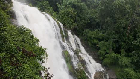 aerial view cascading wachirathan waterfalls. pedestal up