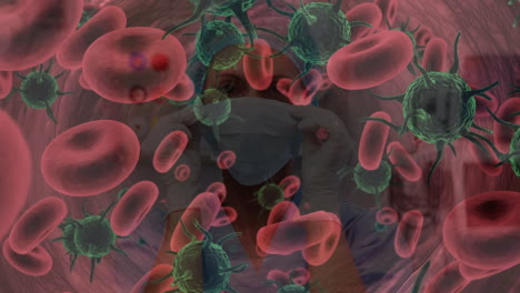 animation of covid 19 cells floating over surgeon in face mask