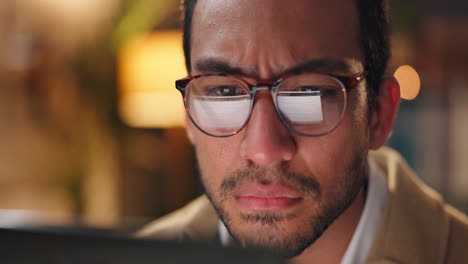 man concentrating on computer