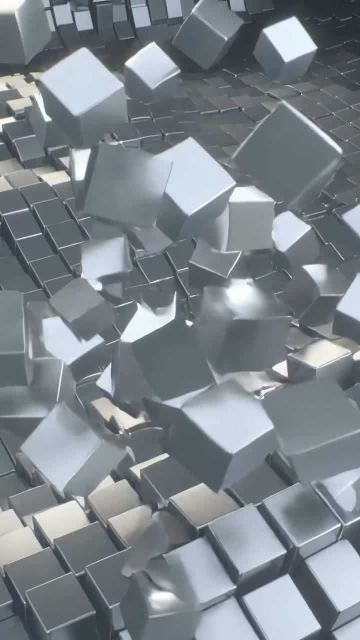 Vertical video: Reacting to disturbance, metallic cube field ejecting detached cubes in studio