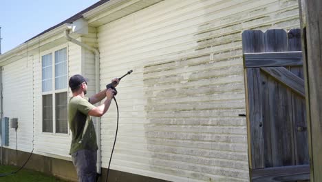 pressure washing the side of a house