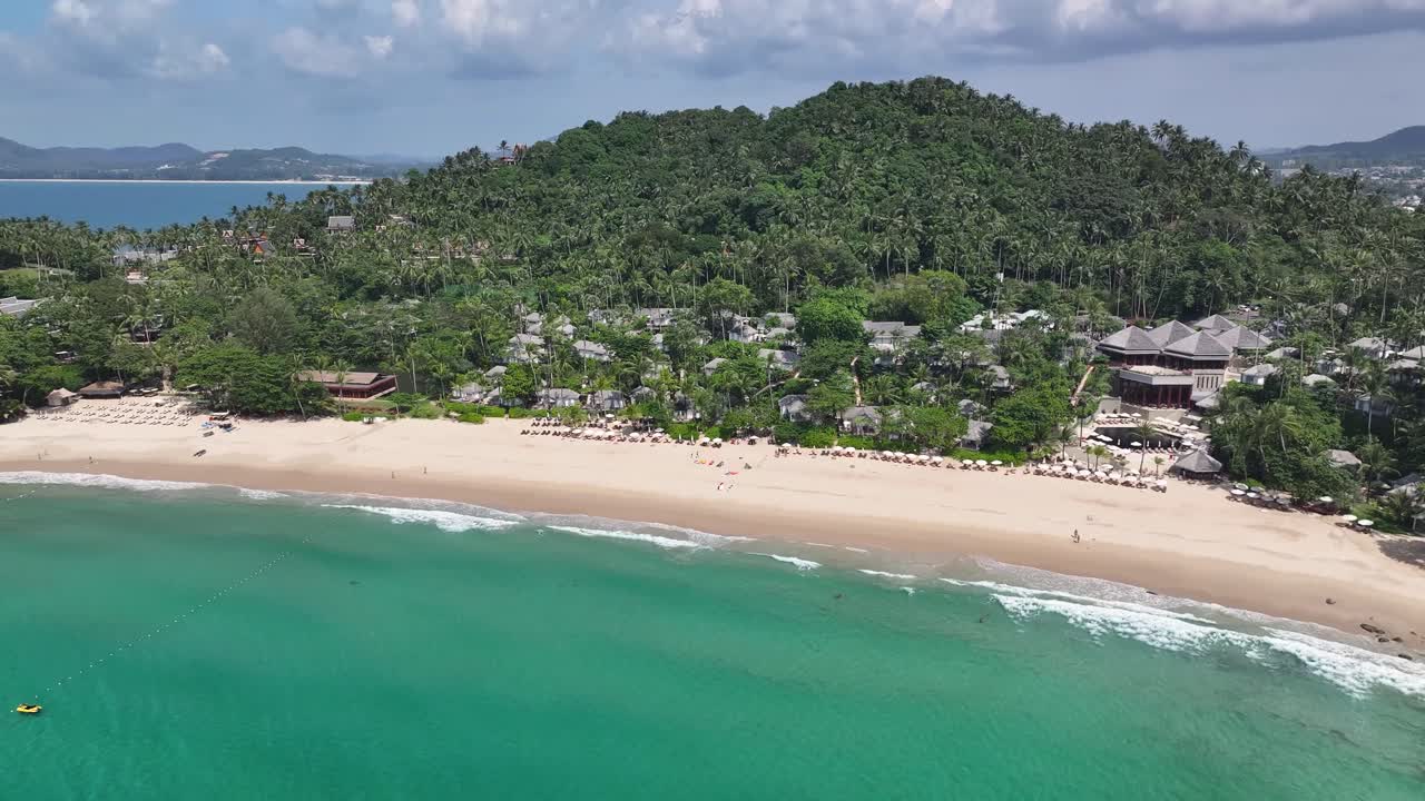 Aerial drone of Pansea Beach in Phuket, luxury island getaway. Thailand coastal with beachfront.