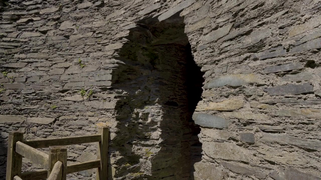 Detailed view of the inside of the Dolbadarn castle tower, steady shot of the door inside the tower. 4k 30fps.