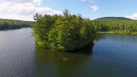 a spectacular 4k drone shot over parker pond and pleasant lake, located in casco, maine, usa