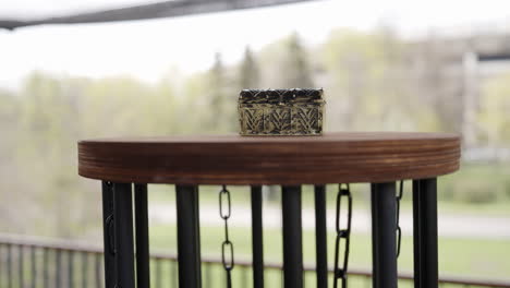 decorative box on wooden stand