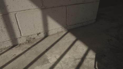 a shadow of metal grill. jail door closing