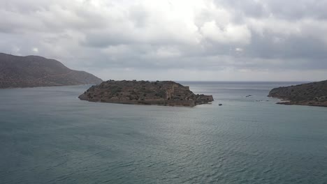 experience the beauty of the island's ancient forts and the rugged mountain landscape as the drone takes you on a journey towards the top of the fort