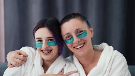 Two-domestic-women-at-home-with-the-patches-under-eyes