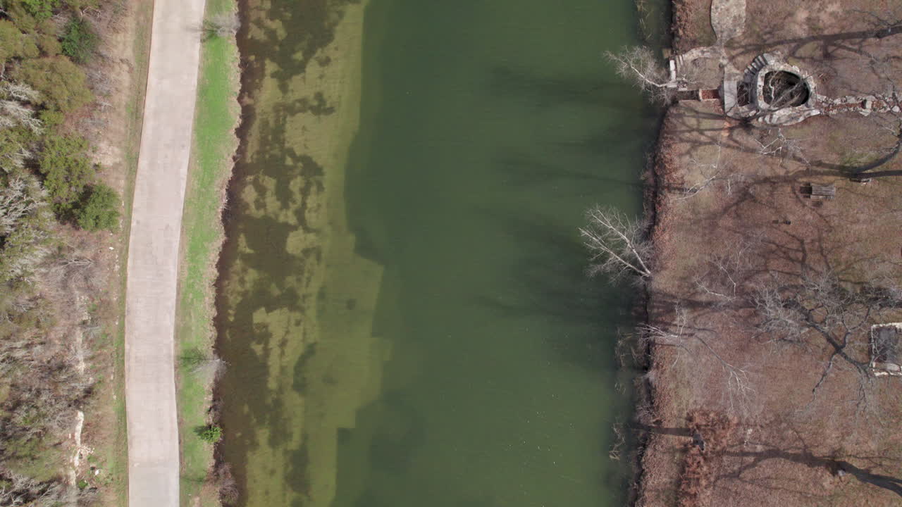 Top Down aerial view following the Blanco River near Blanco, Texas in the Hill Country