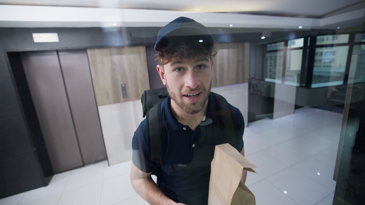Delivery person in apartment building