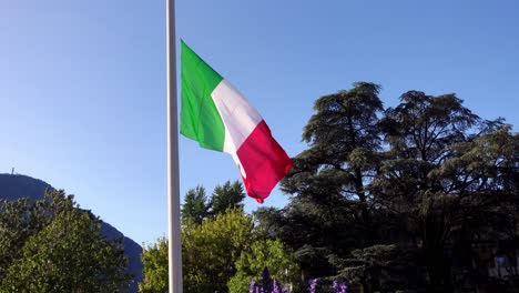 italian flag at half mast. italy in mourning