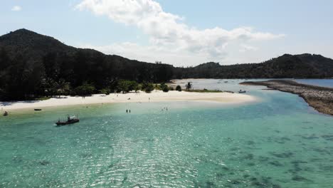 wonderful view over the sandy beach at ao chaloklum bay in koh phangan, thailand, with a drone