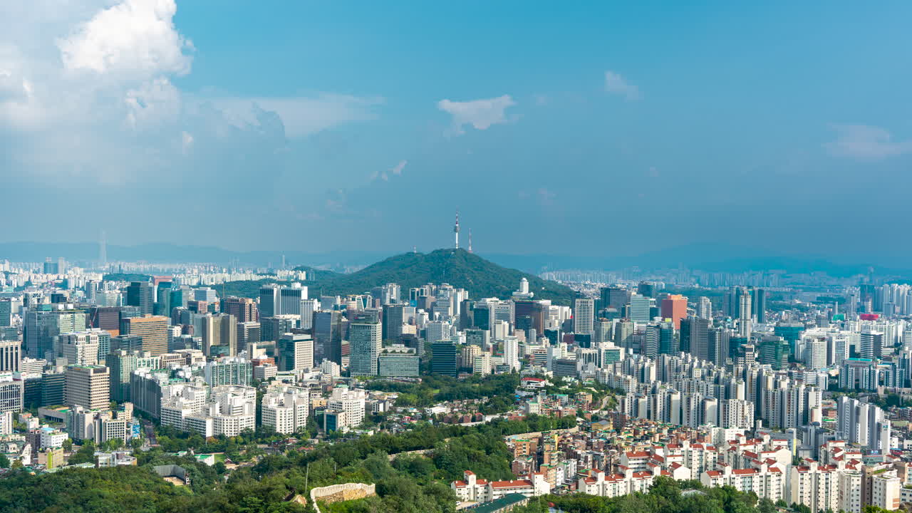 Seoul Summer Cityscape Time Lapse of Clouds Movement Above Megacity, View on Namsan Tower, City Wall from Inwangsan Mountain - zoom in tilt up towards sky