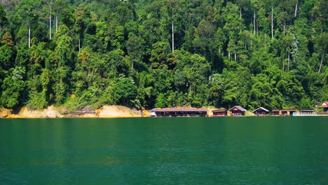 Khao-Sok,-Thailand---The-Wonderful-Scenery-Of-Turquoise-Blue-Water-and-Glorious-Trees---Beautiful-Tourist-Attraction---Wide-Shot