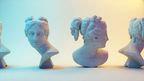 three classical busts in a neon light setting