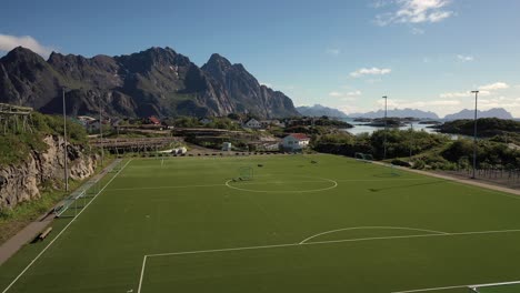 norway lofoten football field stadium in henningsvaer from above.
