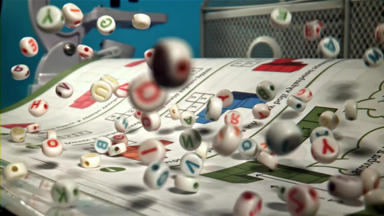 Slow Motion of Letter and Number Beads Bouncing on a Workbook