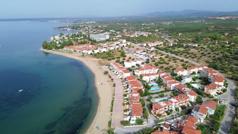 Yerakini's-Gerakini-Beach,-nestled-in-Halkidiki,-Greece,-captured-in-stunning-4K-quality-by-a-daytime-drone