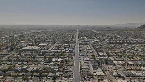 scottsdale arizona aerial v19 establishing drone flyover south tempe neighborhood capturing traffics on the road and cityscape of residential properties - shot with mavic 3 cine - february 2022