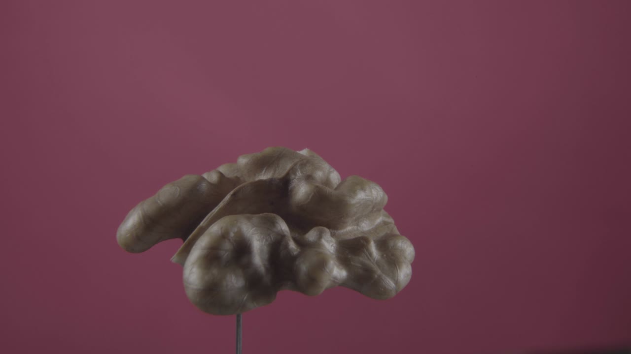 nuez girando con bucle en la pantalla de fucsia para la llave de croma