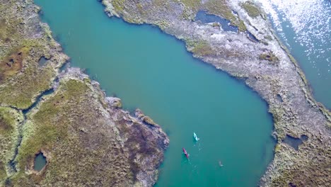 aerial over kayakers rowing through vast bogs along the nonesuch river near portland maine new england 3