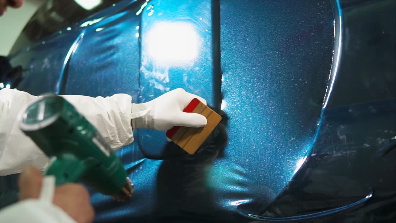 Applying Protective Film to a Car